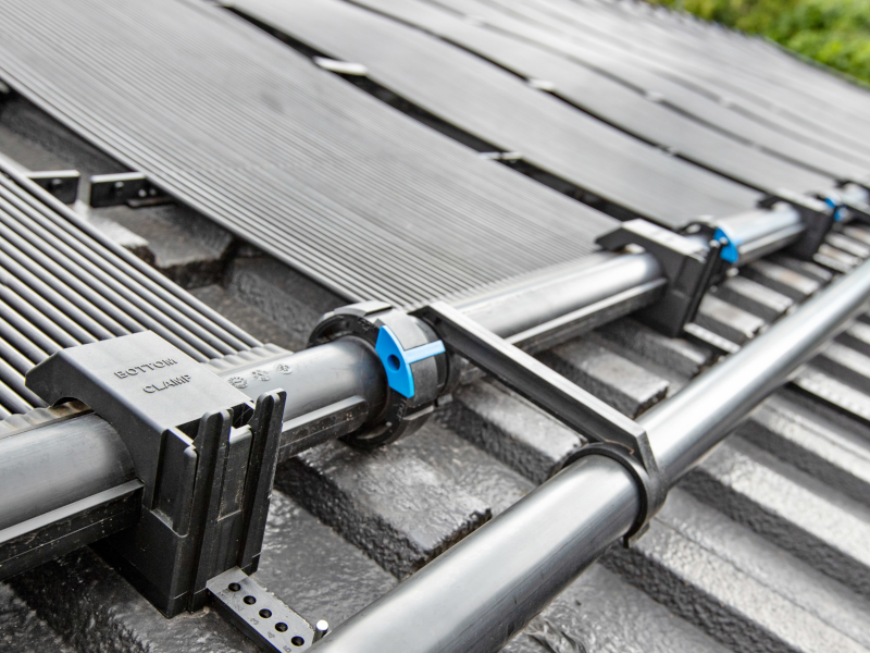 Solar pool heating panels on roof closeup
