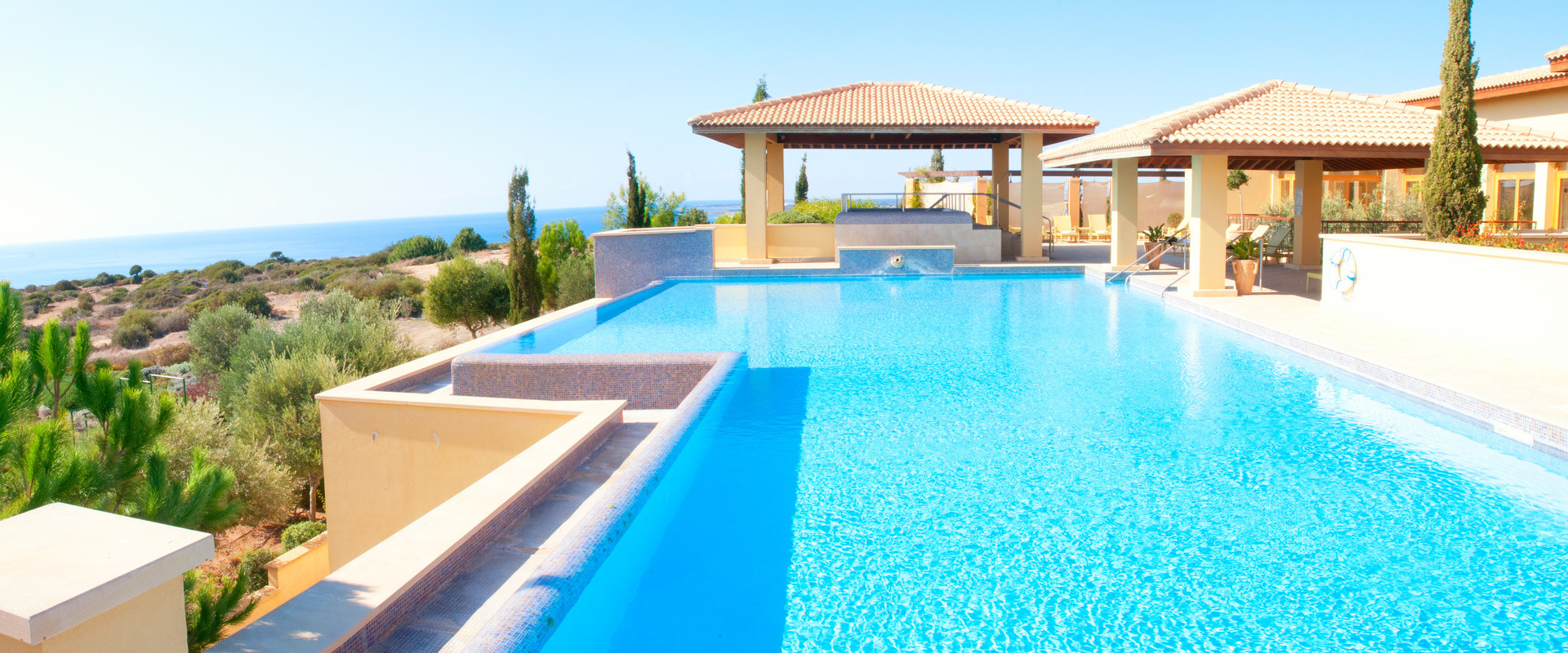 pool in backyard of house in the desert